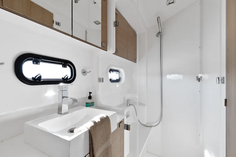 Slide: The Image of Modern bathroom in 2018 Bali 4.0 yacht with sleek fixtures and natural light. - 28