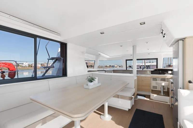 Slide: The Image of Modern interior of 2018 Bali 4.0 catamaran with spacious seating and panoramic windows. - 6