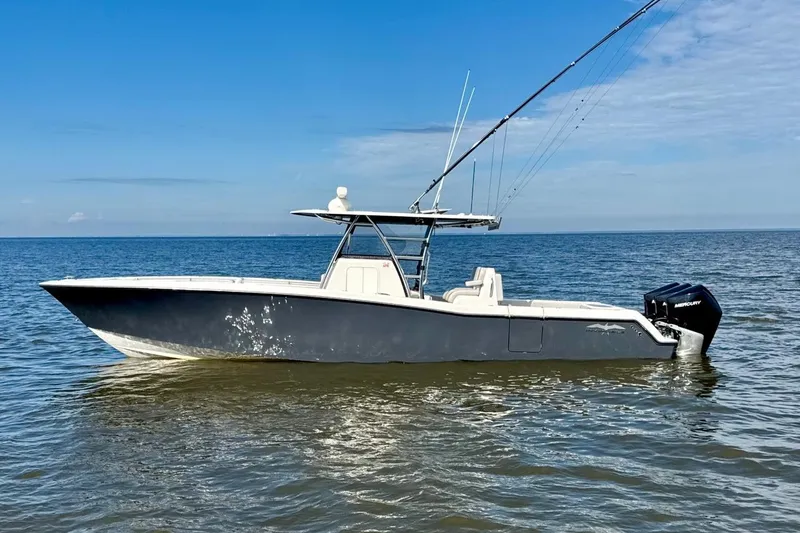 The Image of 2020 Invincible 36 Open Fisherman boat on calm ocean waters. - 1