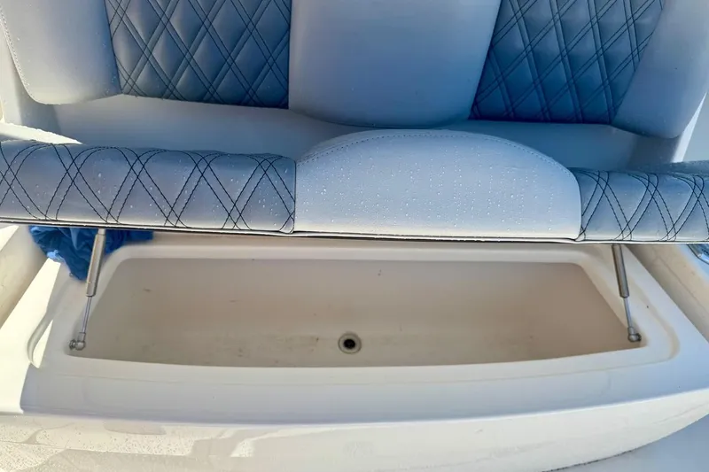 Slide: The Image of 2020 Invincible 36 Open Fisherman seat with storage compartment. - 16