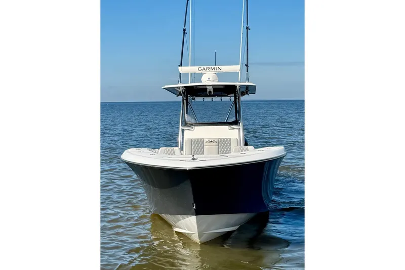 Slide: The Image of 2020 Invincible 36 Open Fisherman boat on calm water, front view. - 4