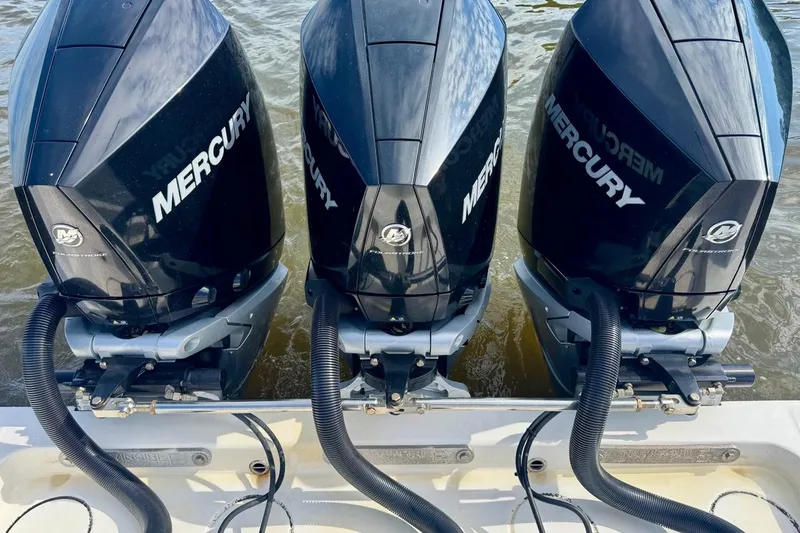 Slide: The Image of Triple Mercury outboard engines on a 2020 Invincible 36 Open Fisherman boat. - 8