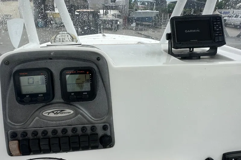 Slide: The Image of Dashboard of a 2014 Tidewater 210 CC Adventure boat with Garmin GPS. - 4
