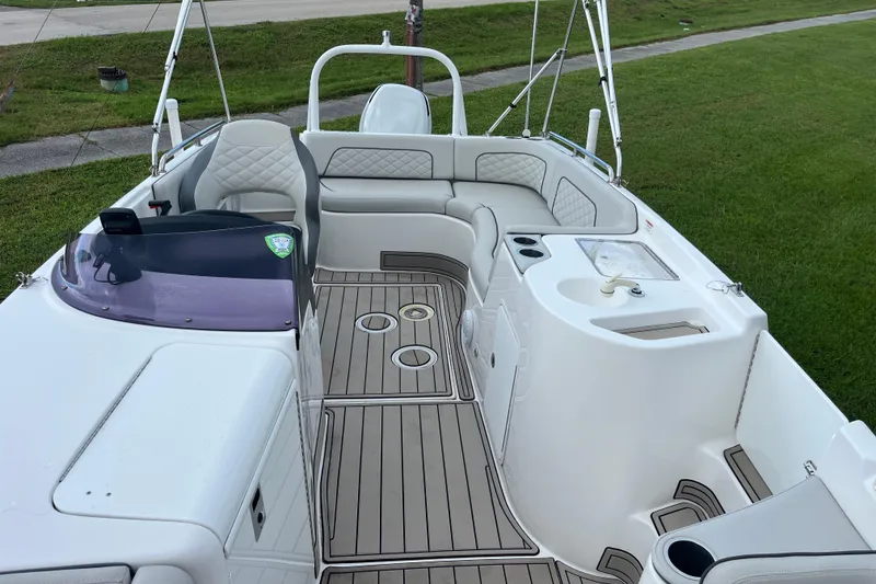 Slide: The Image of 2022 Citation 240 boat interior with seating, steering, and deck features. - 9