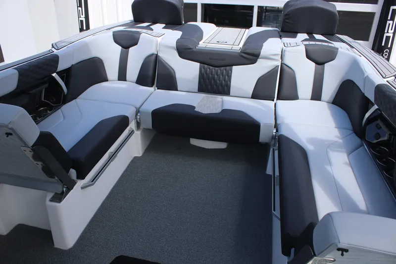 Slide: The Image of 2025 MasterCraft XT24 boat interior with sleek, modern seating and stylish upholstery. - 4