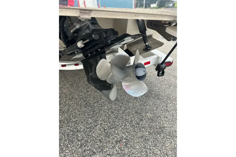 Slide: The Image of 2010 Cobalt 276 boat propeller and outdrive on a trailer. - 11