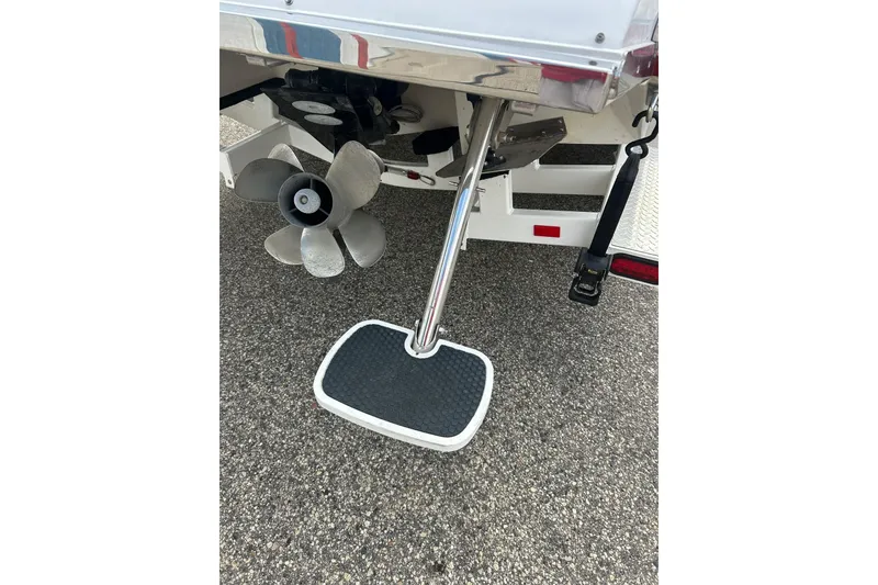 Slide: The Image of Rear view of 2010 Cobalt 276 boat showing propeller and swim platform. - 13