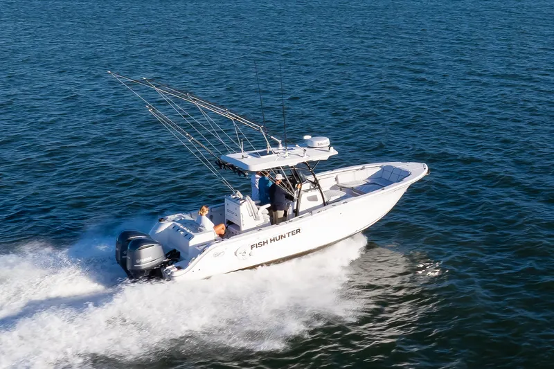 Slide: The Image of 2021 Sea Fox 288 Commander boat cruising on open water. - 12