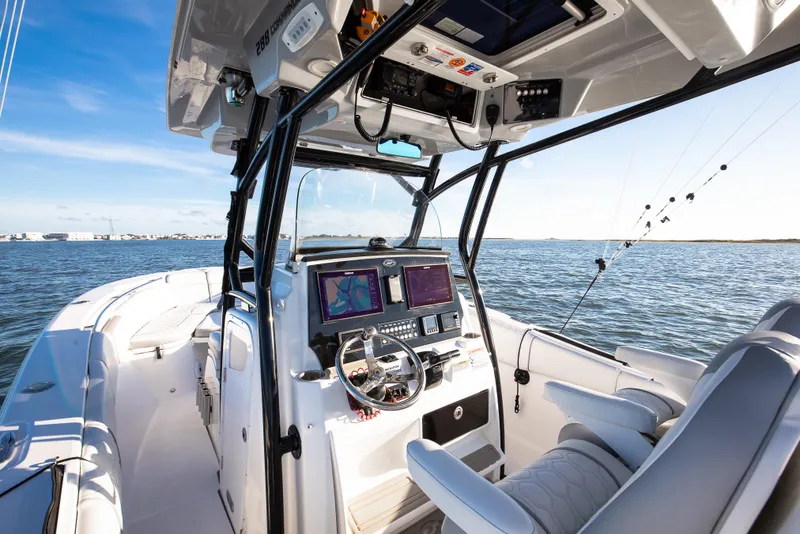Slide: The Image of 2021 Sea Fox 288 Commander boat interior with navigation system on open water. - 5
