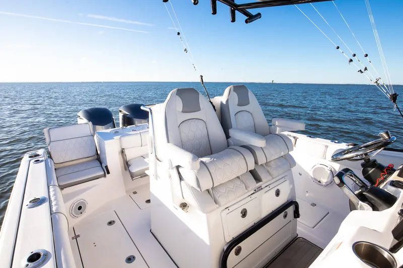 Slide: The Image of 2021 Sea Fox 288 Commander boat interior with dual seats on open water. - 8