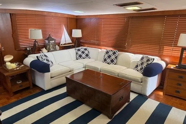 Slide: The Image of Luxurious interior of 1989 Jefferson Marquessa 52 yacht with elegant seating and nautical decor. - 13