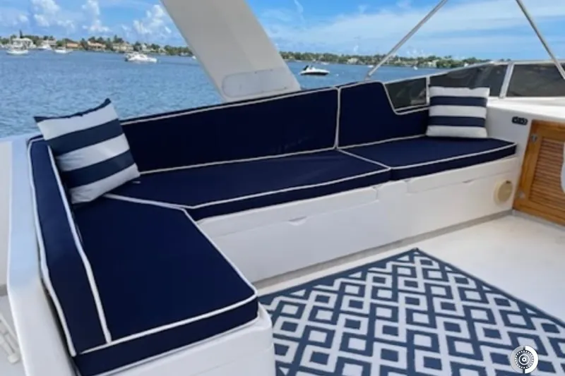 Slide: The Image of Luxurious seating area on a 1989 Jefferson Marquessa 52 yacht with nautical decor. - 5