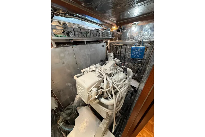 Slide: The Image of Engine room of 1989 Jefferson Marquessa 52 yacht, showcasing machinery and equipment. - 30