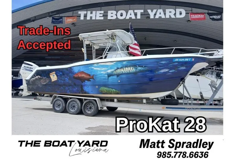 The Image of 2002 ProKat 2860 boat with marine graphics at The Boat Yard, trade-ins accepted. - 0
