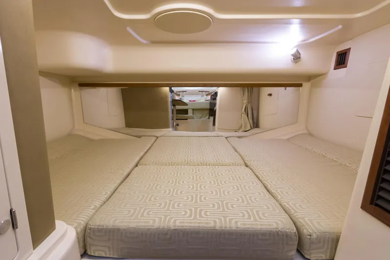 Slide: The Image of Manufacturer Provided Image: Interior cabin of 2020 Grady-White Express 330 with spacious sleeping area. - 26
