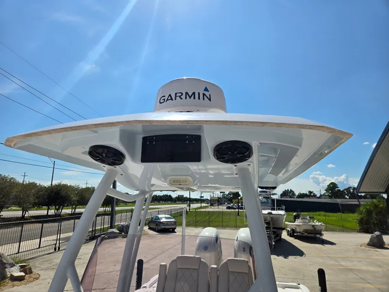 Slide: The Image of Open storage compartment on 2021 Blue Wave 2800 Makaira boat, showcasing spacious interior. - 13