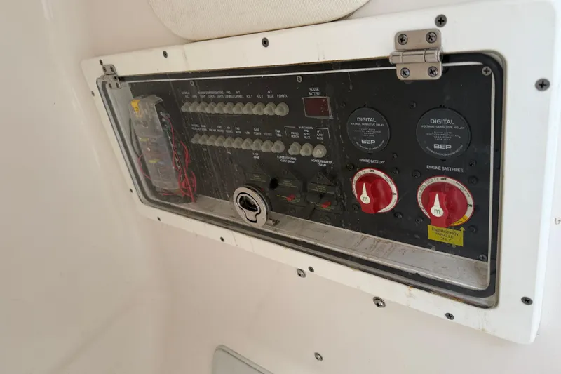 Slide: The Image of Electrical control panel on 2021 Blue Wave 2800 Makaira boat. - 21