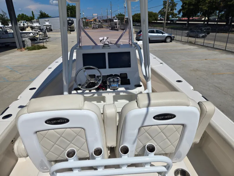Slide: The Image of 2021 Blue Wave 2800 Makaira boat on trailer with dual Suzuki outboard engines. - 4