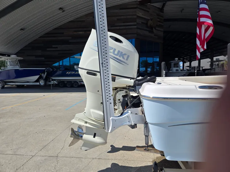 Slide: The Image of 2021 Blue Wave 2800 Makaira boat with spacious, cushioned seating and modern design. - 9