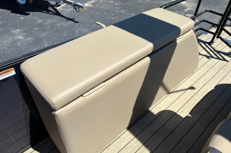 Slide: The Image of 2024 Sylvan L3 CLZ boat seat with beige upholstery on deck. - 7