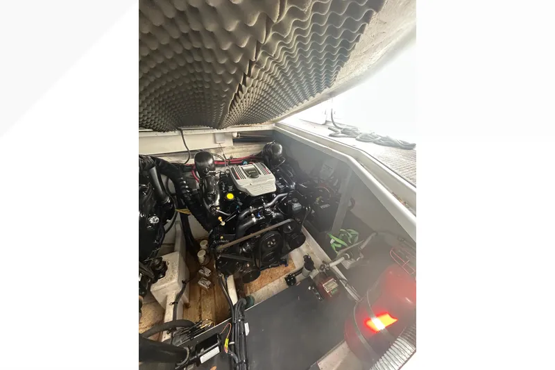 Slide: The Image of Engine compartment of a 2015 Crownline 350 SY boat with soundproofing. - 42