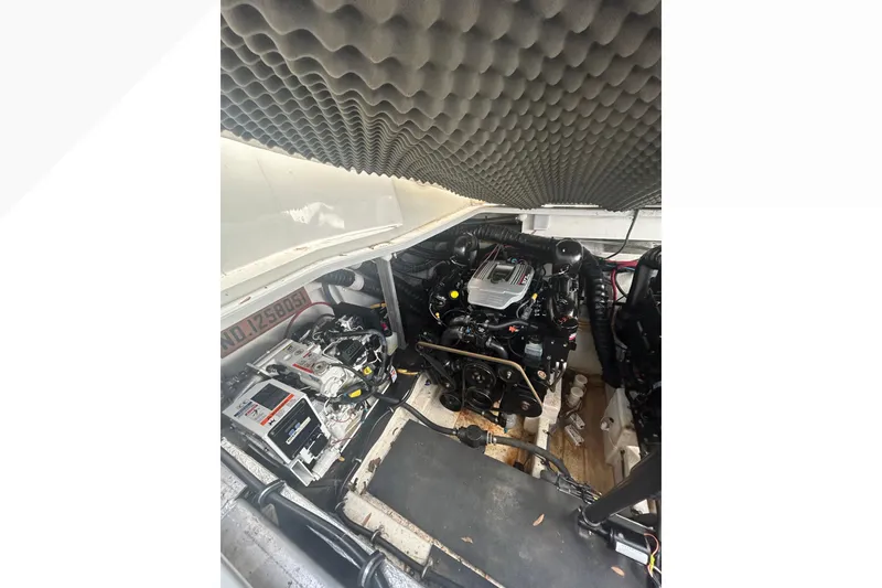 Slide: The Image of Engine compartment of a 2015 Crownline 350 SY boat with soundproofing foam. - 43