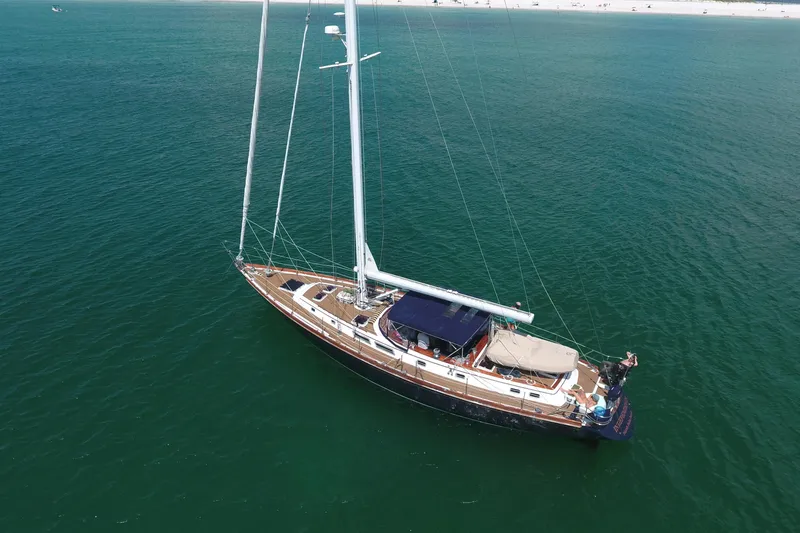 The Image of Aerial view of 1981 Gulfstar 60 CC sailboat on calm ocean waters. - 0