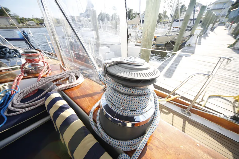 Slide: The Image of 1981 Gulfstar 60 CC sailboat winch with ropes, docked at marina. - 20