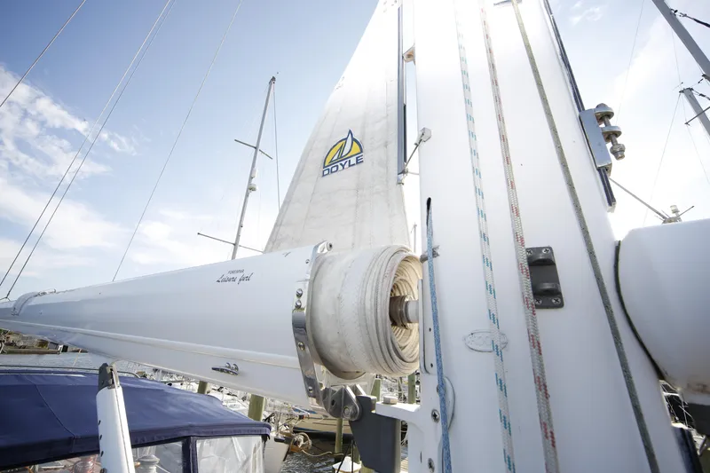 Slide: The Image of 1981 Gulfstar 60 CC sailboat mast and rigging under clear sky. - 22