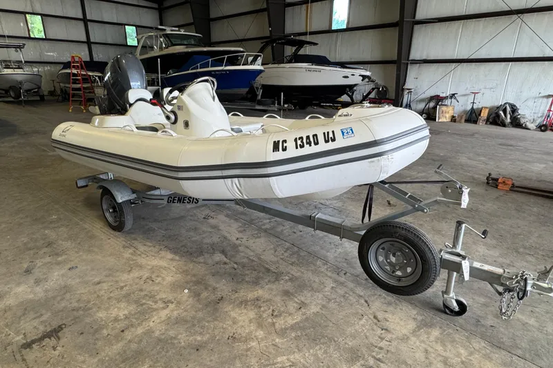 Slide: The Image of 2019 Zodiac Yachtline 400 inflatable boat on trailer in storage facility. - 5