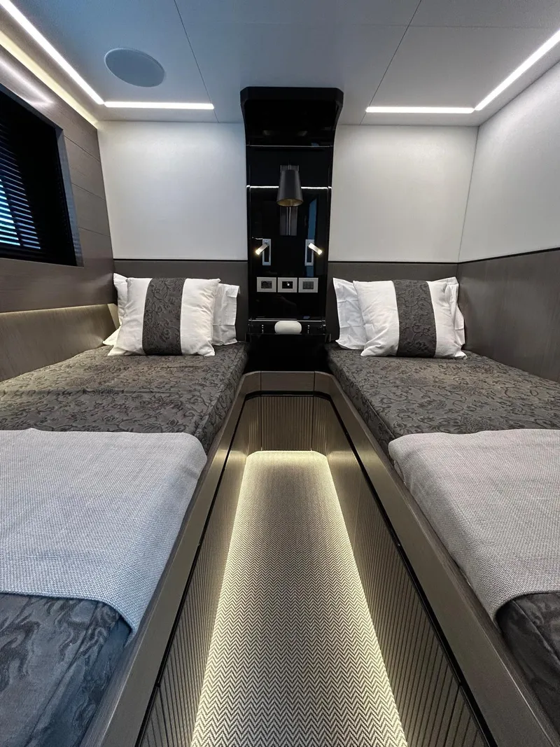 Slide: The Image of Luxurious interior of 2025 Pearl 63 yacht with modern seating and ocean view. - 16