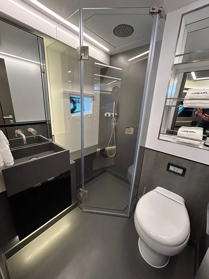 Slide: The Image of Luxurious interior of 2025 Pearl 63 yacht with ocean view and modern seating. - 18