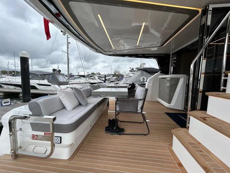Slide: The Image of Luxurious interior of 2025 Pearl 63 yacht with modern design and ocean view. - 20
