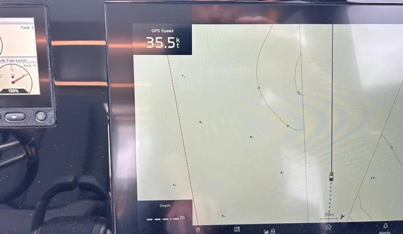 Slide: The Image of Interior of 2025 Pearl 63 yacht cockpit with modern steering and leather seats. - 27