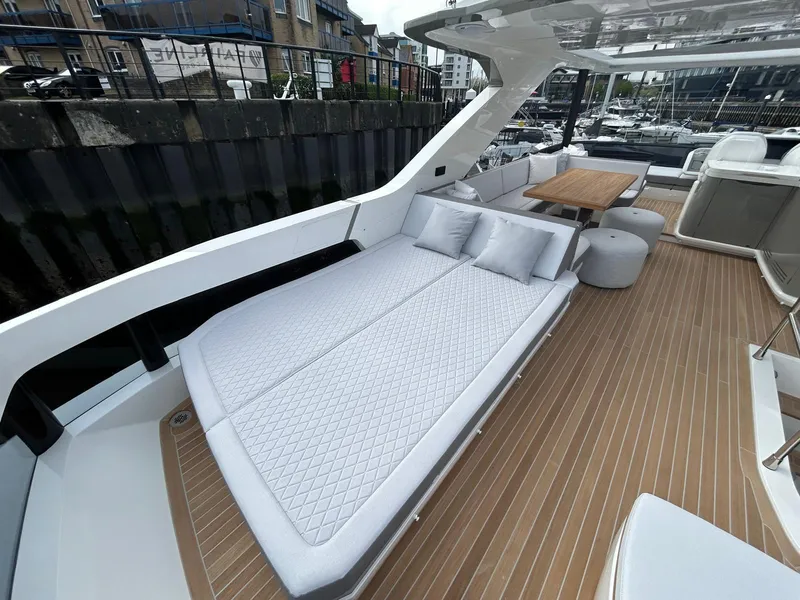 Slide: The Image of Luxurious bedroom interior of 2025 Pearl 63 yacht with modern design and elegant furnishings. - 29