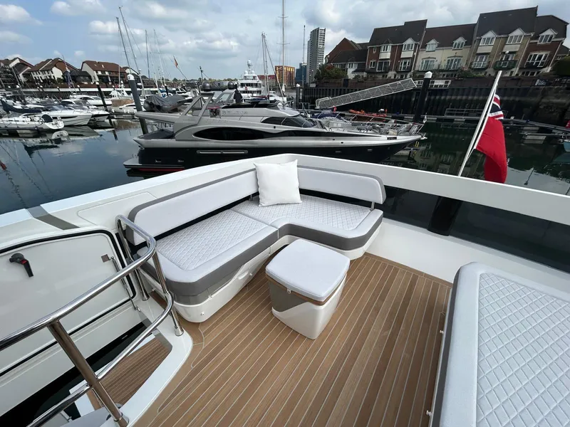 Slide: The Image of Luxurious interior of 2025 Pearl 63 yacht with modern decor and comfortable seating. - 30