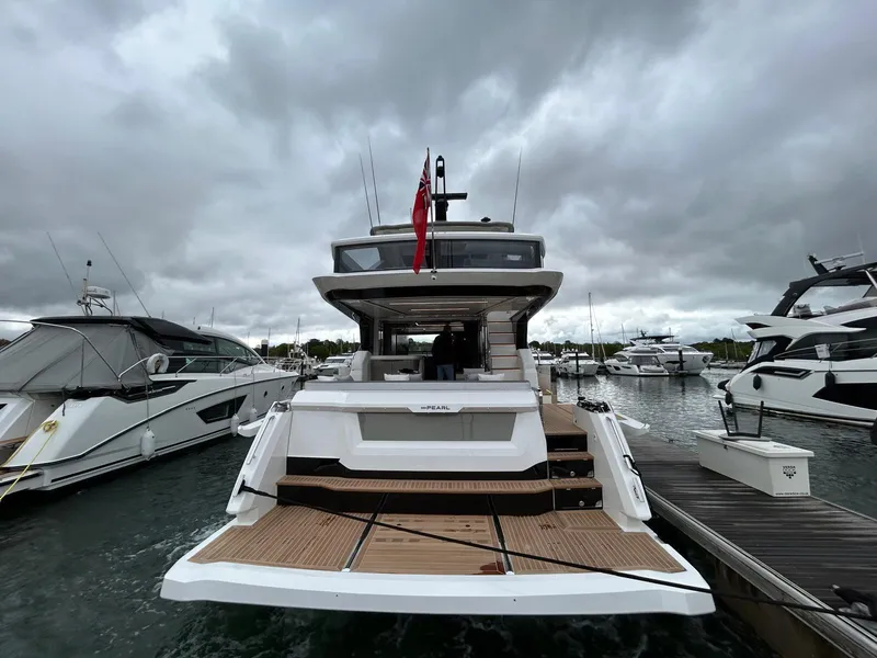 Slide: The Image of Luxurious bedroom interior of 2025 Pearl 63 yacht with modern design and elegant furnishings. - 37