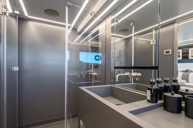 Slide: The Image of Modern bathroom interior in Pearl 63 yacht, 2025 model, featuring sleek design and ambient lighting. - 41