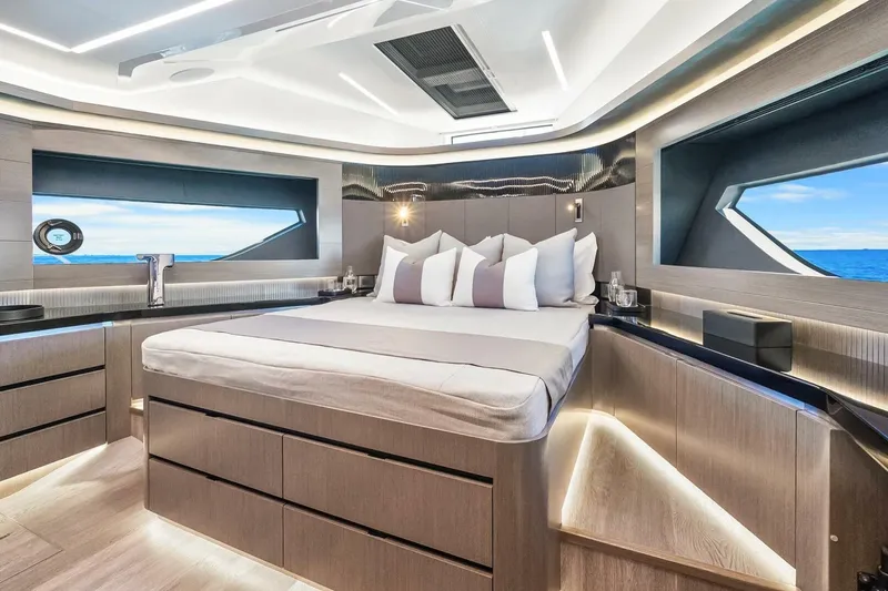 Slide: The Image of Luxurious bedroom interior of 2025 Pearl 63 yacht with modern design and ocean view. - 43