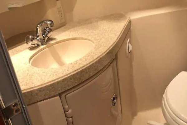 Slide: The Image of 2007 Regal 3060 Window Express bathroom with sink and toilet. - 21