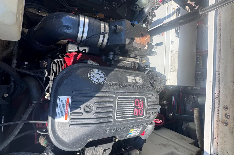 Slide: The Image of Engine compartment of a 2007 Regal 3060 Window Express boat. - 26