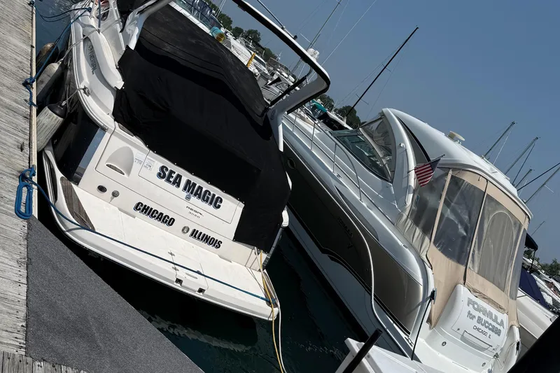 Slide: The Image of 2007 Regal 3060 Window Express boat docked in Chicago marina. - 3