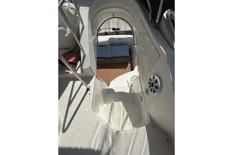 Slide: The Image of 2006 Carver 38 Super Sport yacht interior with stairs and seating area. - 9