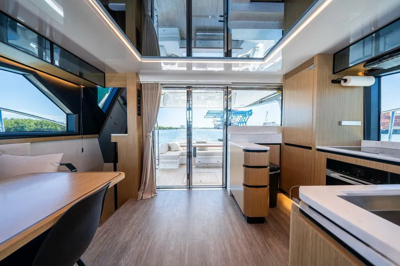 Slide: The Image of Luxurious interior of 2023 Pearl 62 yacht with modern design and spacious layout. - 14