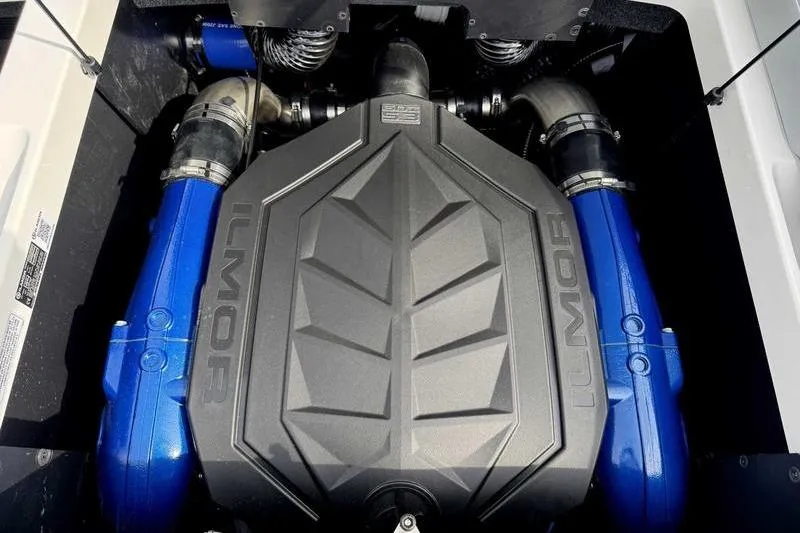 Slide: The Image of 2026 MasterCraft NXT22 engine with Ilmor cover, featuring blue components. - 3