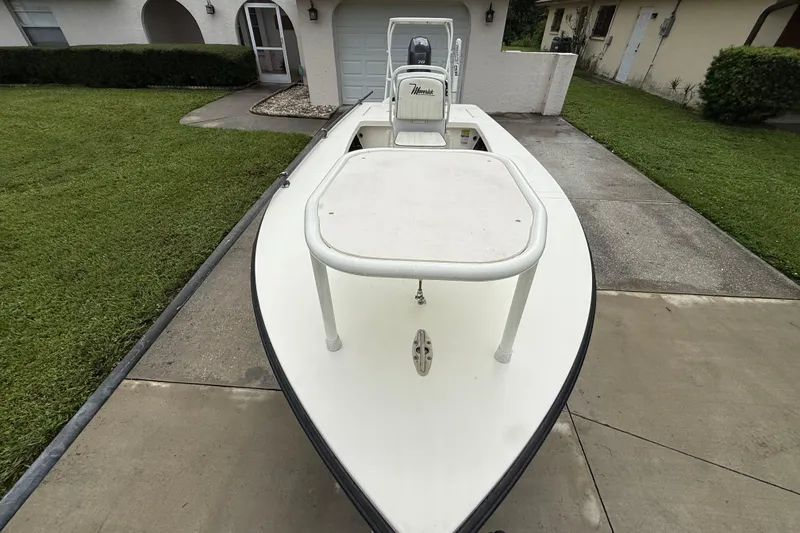 Slide: The Image of 2021 Maverick 17 HPX-S boat parked on driveway, front view. - 17