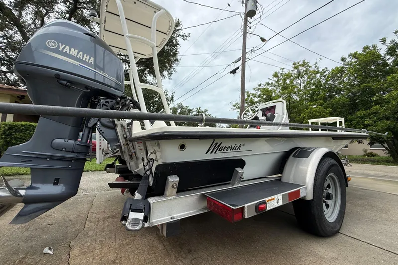 Slide: The Image of 2021 Maverick 17 HPX-S boat with Yamaha outboard motor on a trailer. - 22