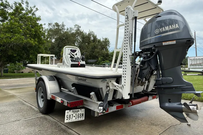 Slide: The Image of 2021 Maverick 17 HPX-S boat with Yamaha outboard motor on a trailer. - 4