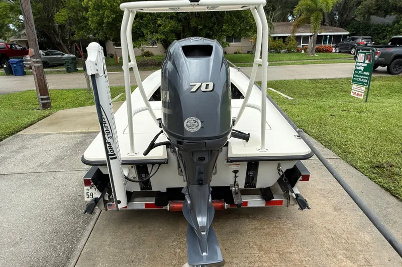 Slide: The Image of 2021 Maverick 17 HPX-S boat with Yamaha 70 engine on trailer. - 9