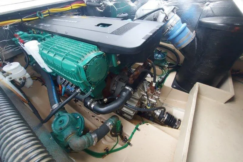 Slide: The Image of Engine compartment of a 2018 Cutwater C-30 CB boat, showcasing mechanical components. - 68